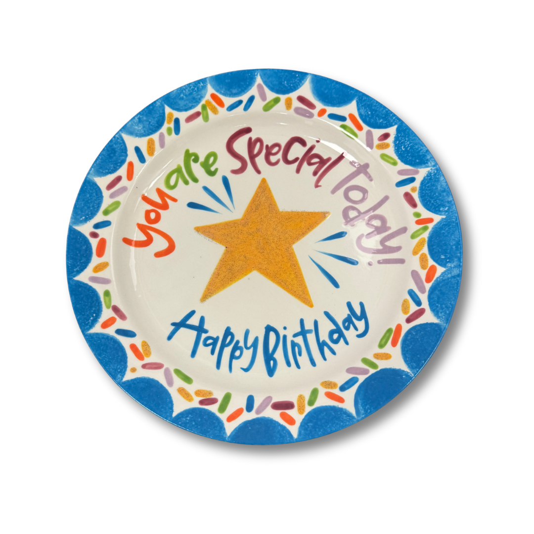 Children's birthday plate with colorful text and a star on a white background